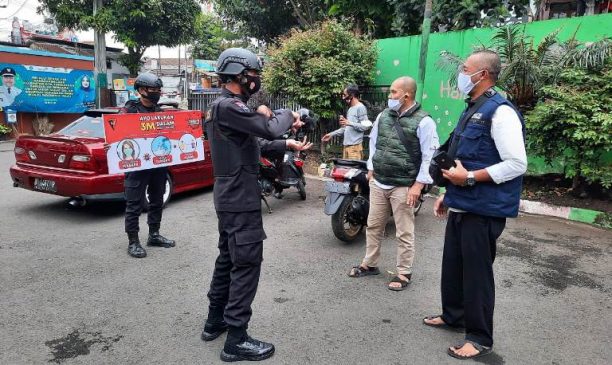 Sat Brimob Polda Jabar Laksanakan Patroli Himbauan 3M di Kantor Desa Lembang