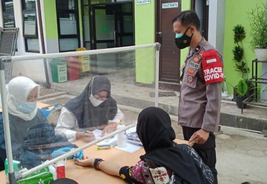 Kabid Humas Polda Jabar: Polisi Pantau Terus Pelaksanaan Vaksinasi di Puskesmas Jelekong