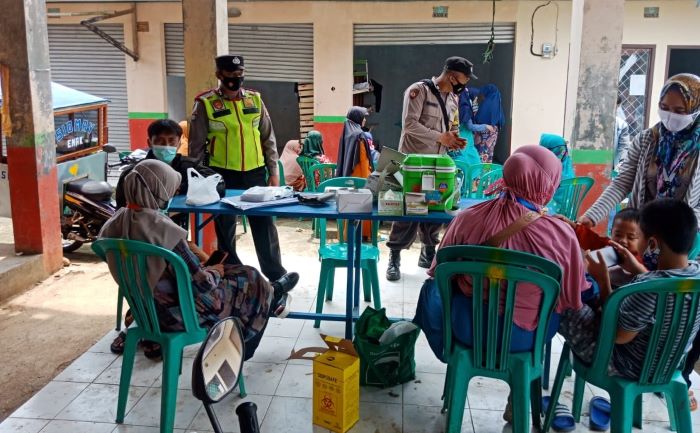Kabid Humas Polda Jabar Polisi Tak Kenal Lelah Monitoring Vaksinasi Lansia