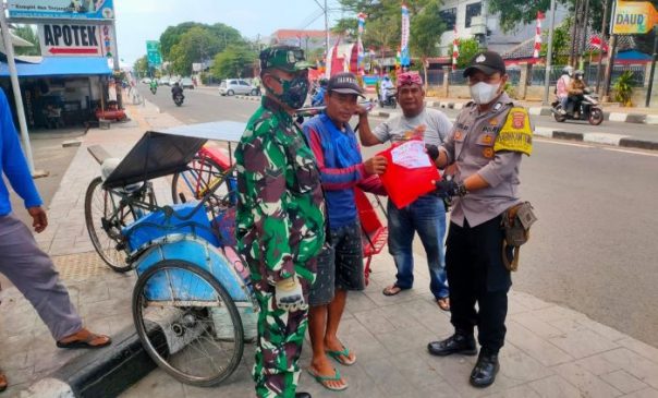 Bluskan ke warga Binaan Polisi Bagikan Sembako di Desa Kebon Baru